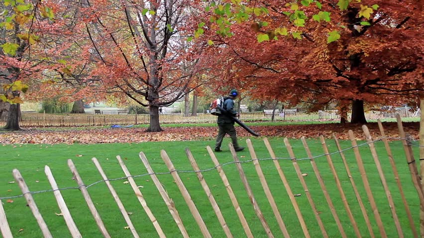 Man with leaf blower in London, England