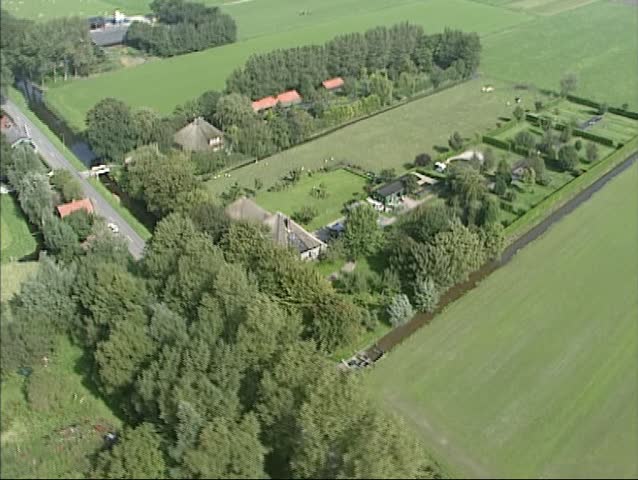 Dome-shaped farm in Dutch polder Schermer, Beemster. The farms, with their characteristic pyramid roofs which provided a home for man, cattle and food, are characteristic for Dutch Beemster polder.
