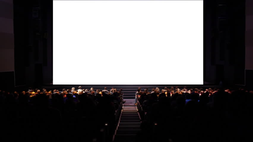 Viewers in the cinema house. Another version is here: http://footage.shutterstock.com/clip-3362798-viewers-in-the-cinema-house-variant%20III-screen-size-was-60-percent-scaled-from-hd..html