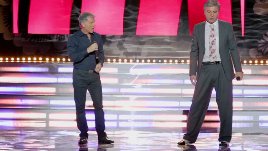 MOSCOW - NOV 30: Soso Pavliashvili and Oleg Gazmanov in musical program on stage of Russian beauty - 2011 contest, on November 30, 2011, Moscow, Russia.