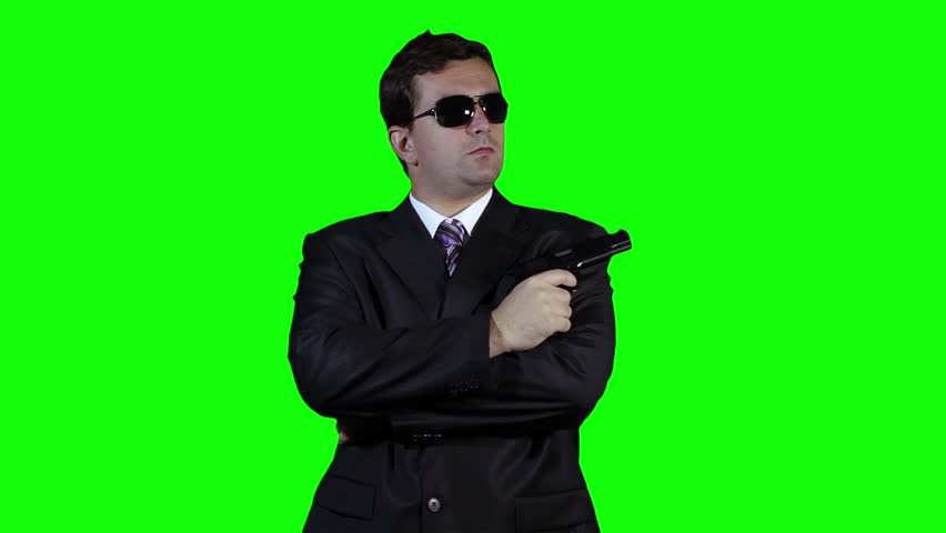 Bodyguard with Pistol Gun Watching Greenscreen 32
The gun is illustration.Airsoft Colt M1991A1
It was shot against green screen and is keyed out.The bg is green  removing it is easy spills are removed