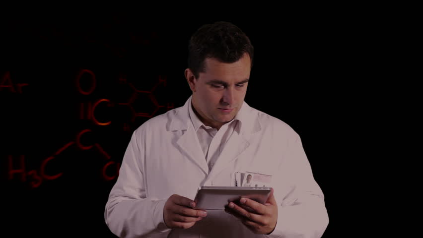 Scientist using Tablet PC with Scientific Chemistry Background