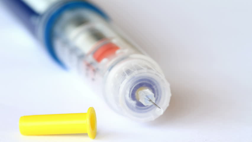Insulin Syringe Pen on the Table. HD Shot With Motorized Slider.

