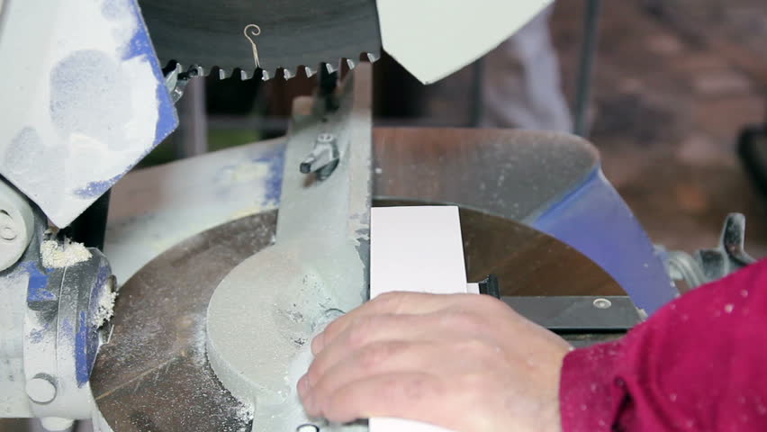 Circular Saw Cutting Window Profile.
Worker cutting PVC profile with circular saw. HD1080p.