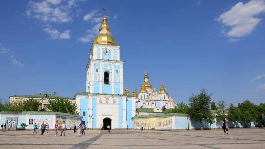 KIEV, UKRAINE, JUNE 3, 2012: People near Mikhailovsky Golden-Domed Monastery on Mikhailovskaya square in Kiev, Ukraine, June 3, 2012