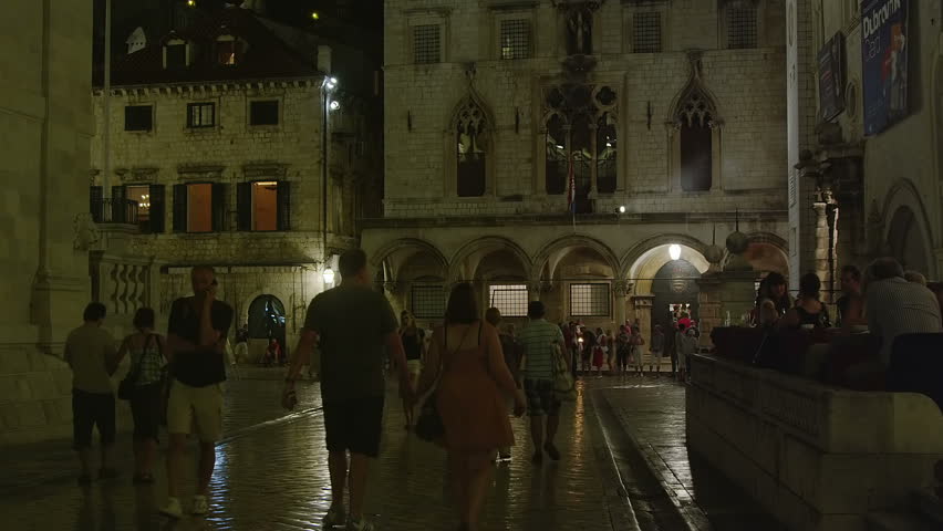 DUBROVNIK, CROATIA - SEPTEMBER 3 2012 - Summer atmosphere with tourists sightseeing and movement around at main Placa(Stradun) street on September 3, 2012. in Dubrovnik, Croatia.