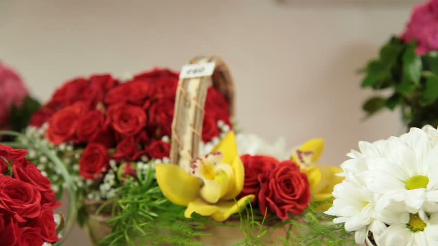 Fresh Flower Baskets And Arrangements In Florist Shop. Closeup, Tracking Shot