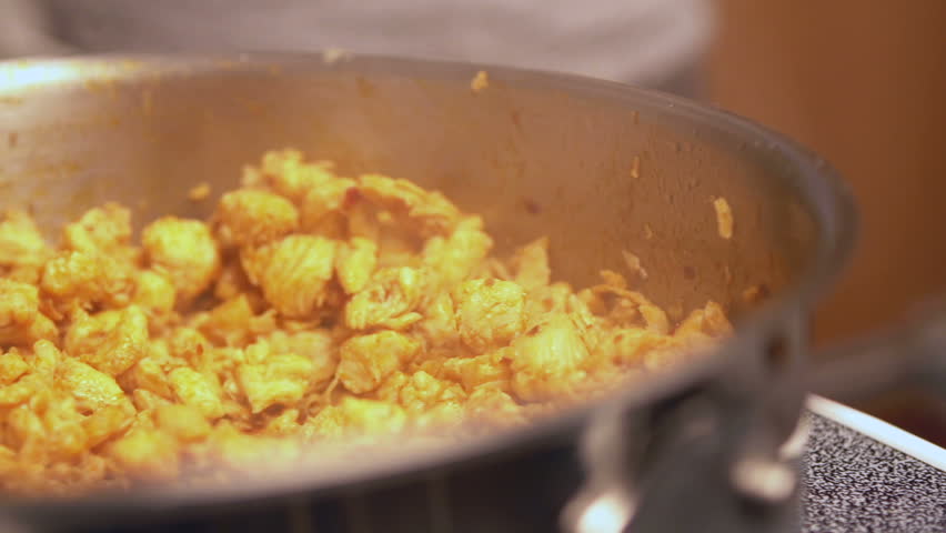 Spicy Chicken in skillet pan shot