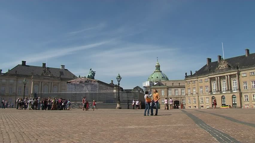 Copenhagen â AUGUST 4:  Royal Guards during the ceremony of changing the guards at Amalienborg Castle on August 4, 2011 in Copenhagen, Denmark