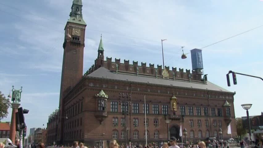 Copenhagen â AUGUST 4: Town Hall square and Lure Blowers statue in the center of Copenhagen on August 4, 2011 in Copenhagen, Denmark