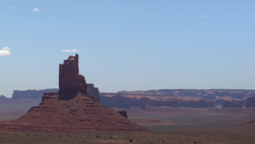 aerial shot of Monument Valley buttes zoom out