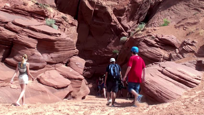 ANTELOPE CANYON NP, - AUGUST 20: A group of tourists at Antelope Canyon. August 20, 2012 in Antelope Canyon, Arizona, USA.