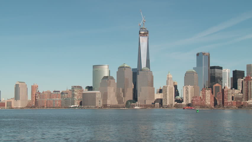 The Freedom Tower, under construction as part of the new World Trade Center complex, rises over the skyline of lower Manhattan in New York City.
