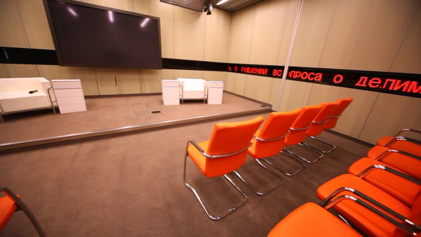 MOSCOW - FEB 28: (rotate camera) TV screen in conference room in RIA Novosti, Feb 28, 2013 Moscow Russia. RIA Novosti was awarded Digital Communications Awards-2013 in nomination best digital-strategy