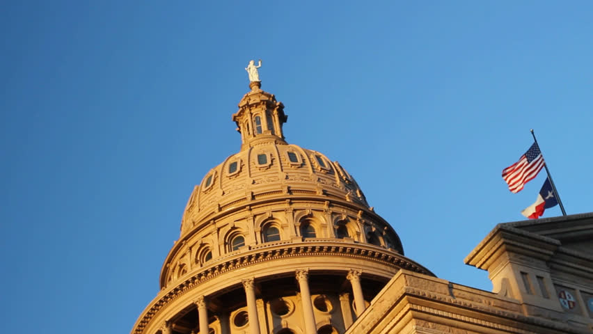 AUSTIN, TEXAS - MARCH 14: State Capital of Texas on March 14, 2013 in Austin, Texas. Made from red granite in the Italian 15th century style Renaissance Revival and finished in 1888. 