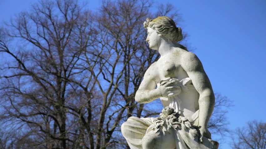 historical sculptures and a blue sky in 1080p. sculptures showing nymphs at a castle in germany, duesseldorf