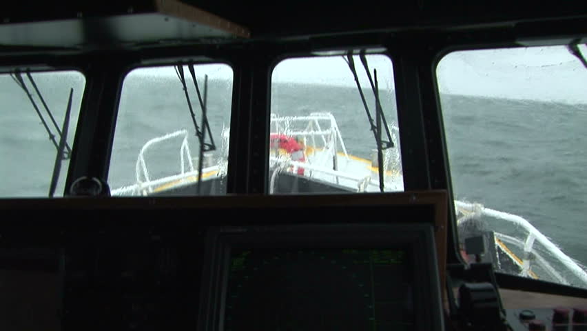 Pilot boat in agitated waters on the Columbia River, OR