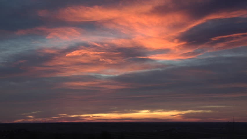 Ray of Hope. Just a little sunrise color on these dense cirrus and cirrostratus