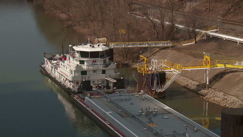 INDUSTRY, PA - MARCH 31: Marathon Petroleum towboat (pushboat) "Marathon" sits docked on the Ohio River on March 31, 2013 at the Industry/Midland, Pennsylvania facility.