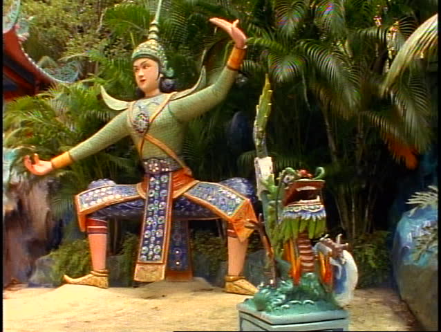 Singapore Tiger Balm Gardens, pan right Thai figure medium shot