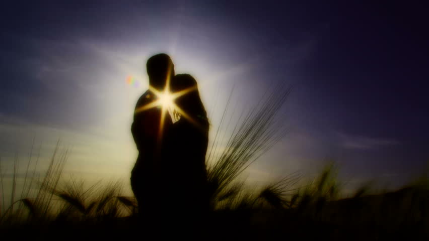 Lovers in field Silhouette