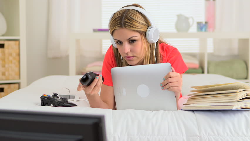 Mexican teenager watching television