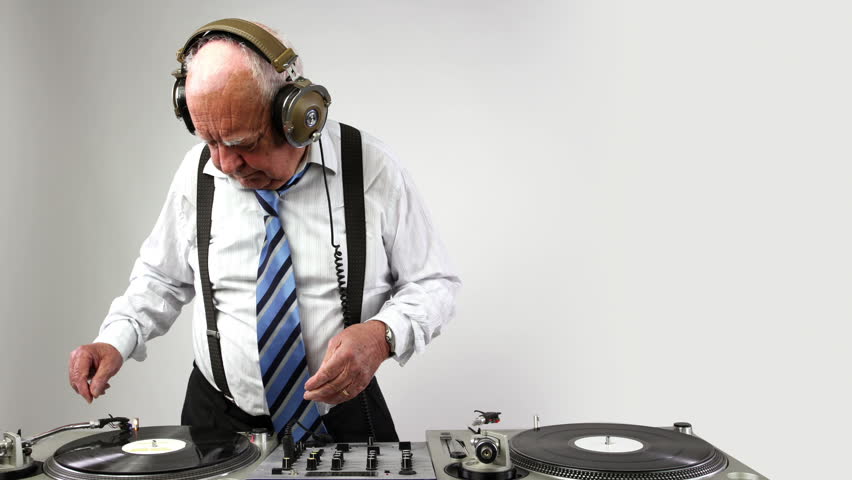a very funky elderly grandpa dj mixing records
