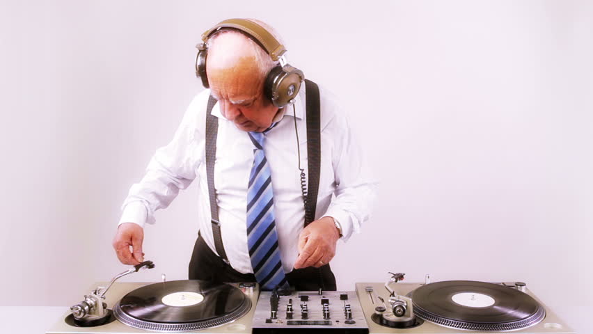 a very funky elderly grandpa dj mixing records
