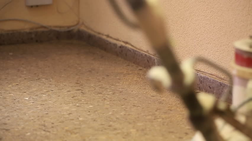 cleaning floor with machine over the corner