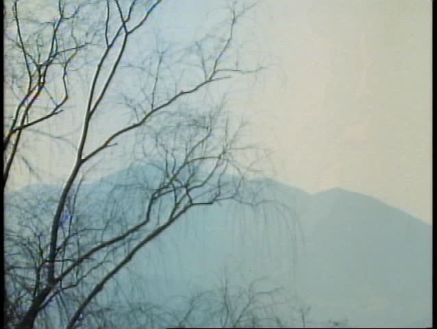 PUSAN - SOUTH KOREA - CIRCA - 1982: A misty late winter scene of South Korea near Pusan