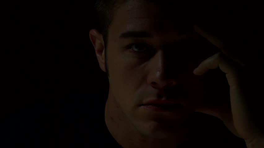 Man thinking in color. Experimental lighting