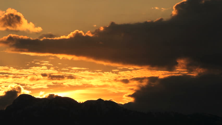 Coast Mountain Sunrise, Vancouver. The sun rises behind the Coast Mountain Range on the North Shore of Burrard Inlet, Vancouver, British Columbia.
