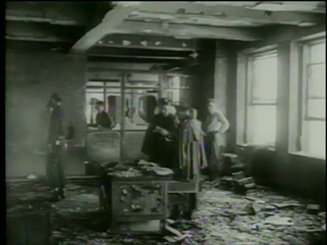 Police investigate 79th floor of Empire State Building site due to impact damage from airplane on July, 28, 1945 in New York City-MGM PICTURES, UNIVERSAL-INTERNATIONAL NEWSREEL, USA, filmed in 1964
