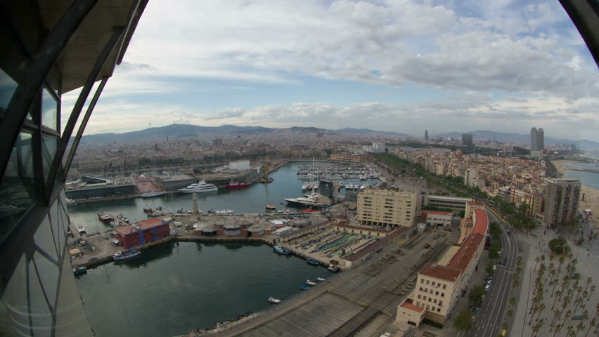 timelapse of the beautiful barcelona skyline shot from a high vantage point