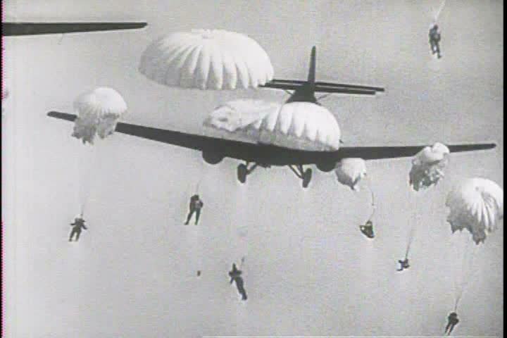1940s - Paratroopers leap from planes during World War Two and the Korean War.
