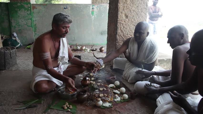 India, Hampi - 31 December 2012: Men participate in mysterious rite in Hampi