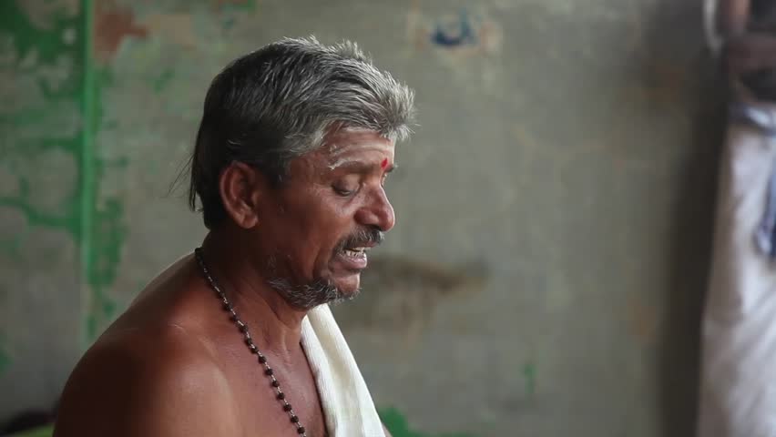 India, Hampi - 31 December 2012: Men participate in mysterious rite in Hampi