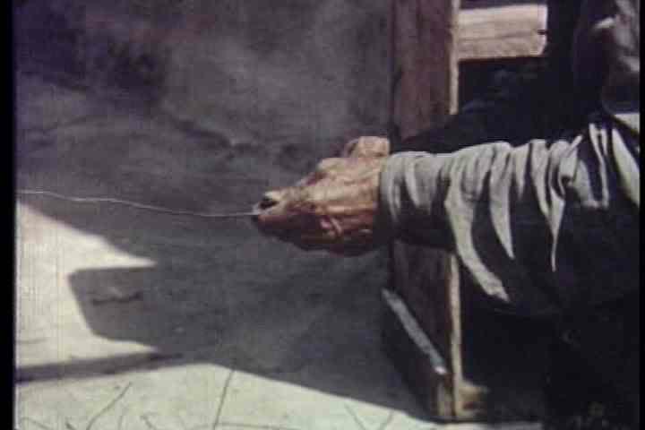 1950s - Simon Rodilla works on the Watts Towers in Los Angeles in 1957.