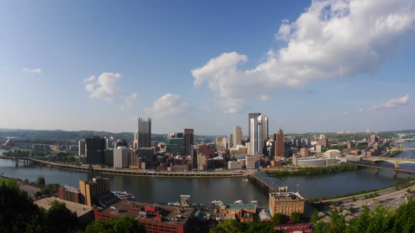 A time lapse of the Pittsburgh skyline. Logos obscured for stock footage use. Available in 4K upon request.