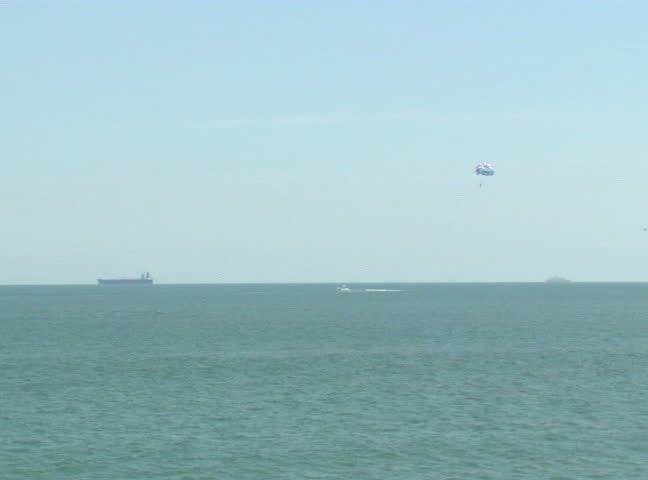 Parasailing in distance