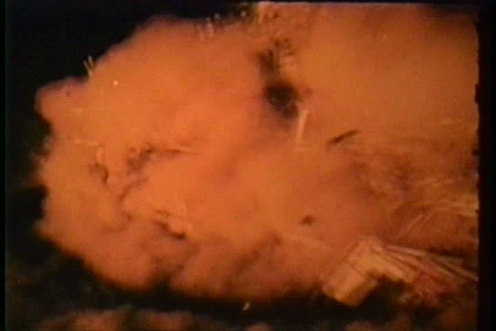 1950s - A model village is blown away by a nuclear bomb blast in the Nevada desert.