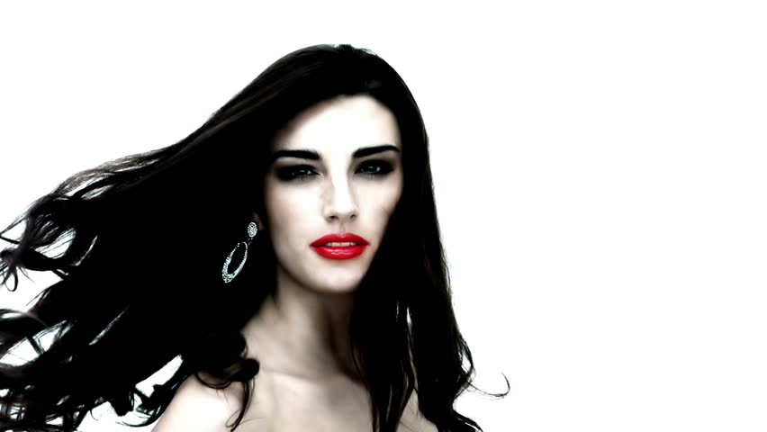 Young Woman Tossing Her Black Hair On White Background In Slow ...