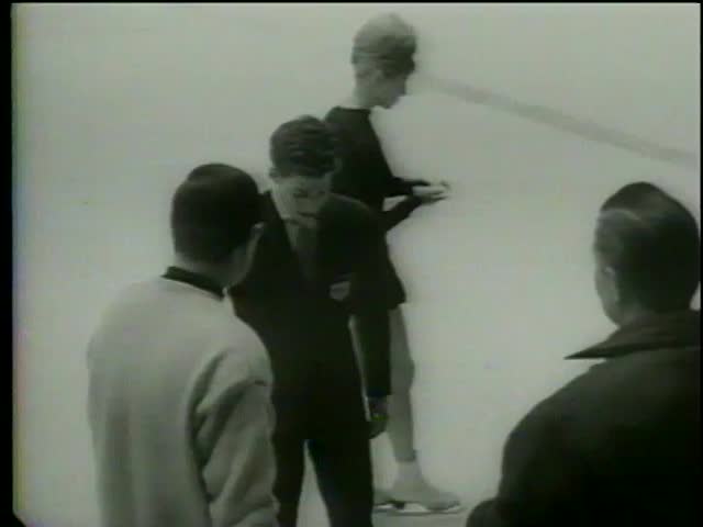 US figure skater Scott Allen exits skate rink after performance during IX Olympic Winter Games in Innsbruck, Austria circa 1964-MGM PICTURES, UNIVERSAL-INTERNATIONAL NEWSREEL, USA, filmed in 1964