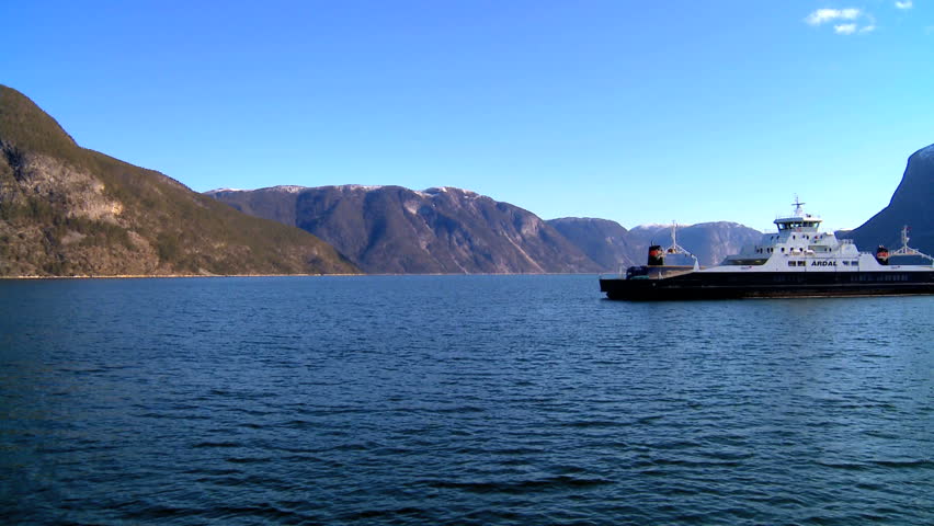 Passenger ferry sailing on a glacial nordic fjord
