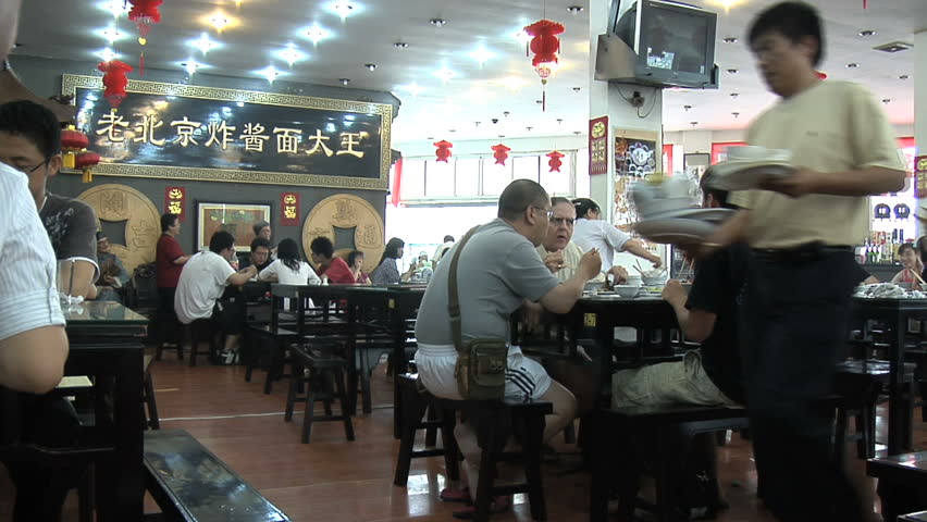 BEIJING - MAY 16 2009: Tourists are starting to return to popular vacation spots and eating in restaurants after the world wide recession starts showing signs of recovery. 