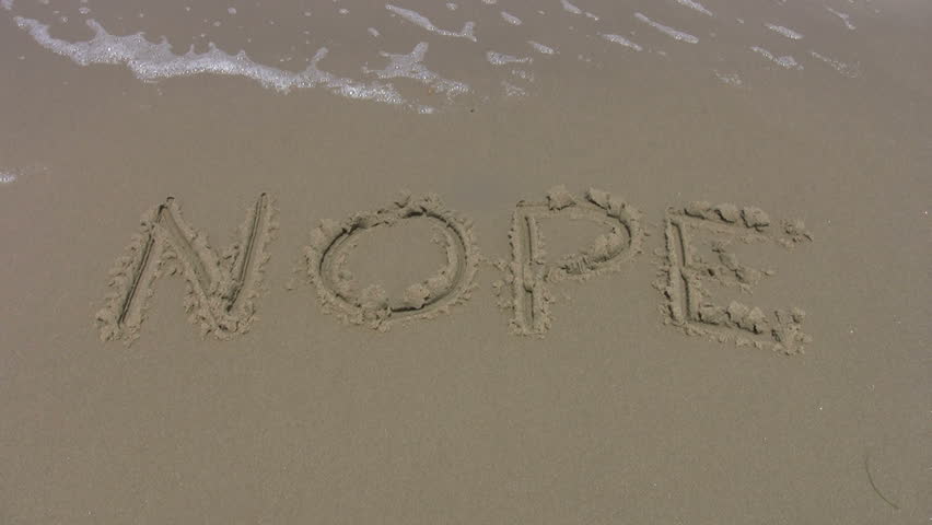 Video of the word NOPE scratched in sand of beach. Waves washing the word away. Gulf of Mexico. Clean sand. Don Despain of Rekindle Photo