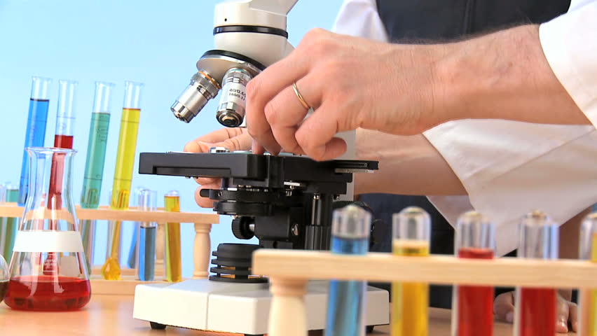 Teacher & elementary pupil early learning science