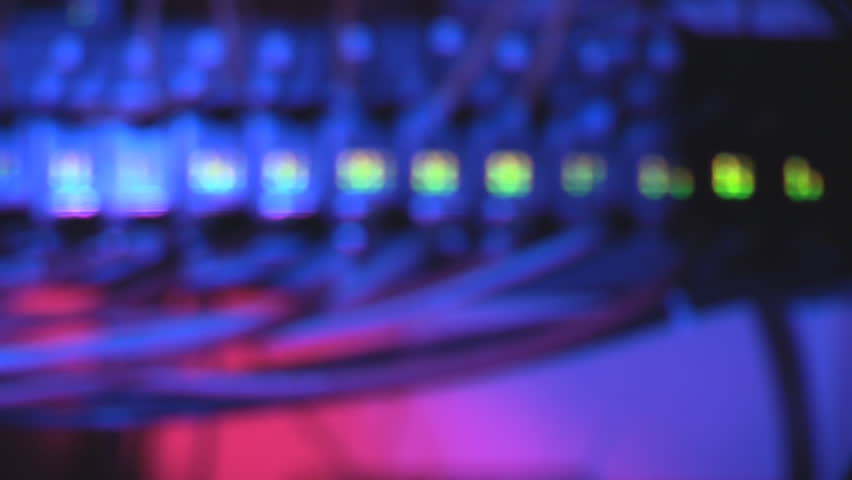 Fiber optic and ethernet cables connected into media converters