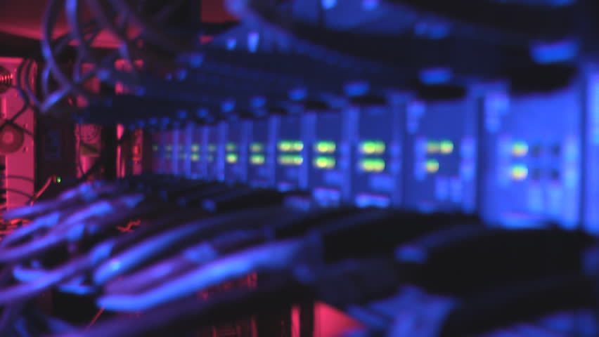 Fiber optic and ethernet cables connected into media converters