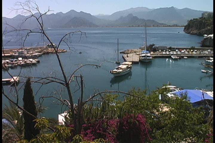 Boats arriving in a harbor in Antalya, Turkey